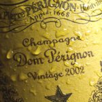 "Philadelphia, USA - February 17, 2012: Close-up of the label on a bottle of Dom Perignon champagne, Vintage 2002. Produced by Moet + Chandon, Dom Perignon is a Vintage champagne or sparkling wine, and all grapes used to make the wine are harvested in only the best years."