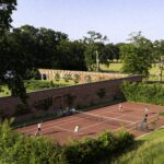 Tennis in a walled garden